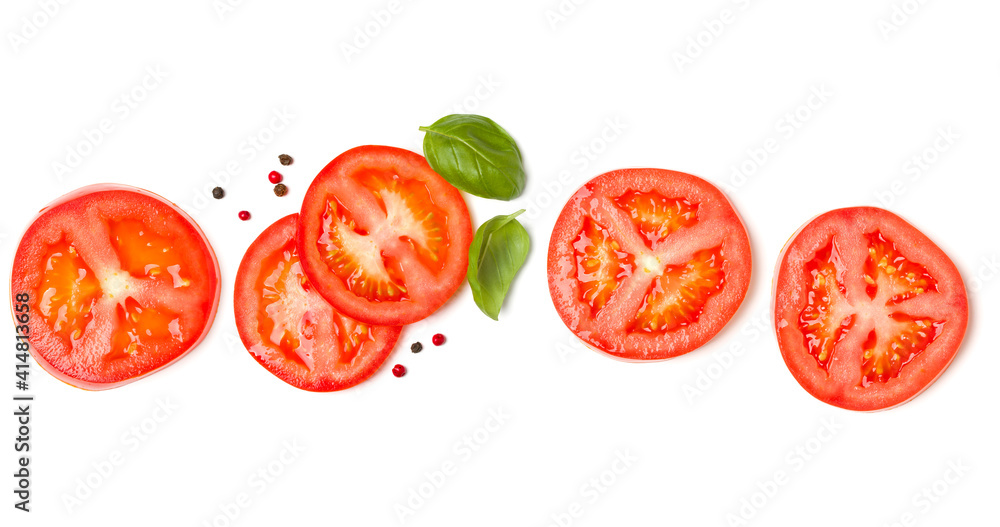 Creative layout made of tomato slices and basil leaves. Flat lay, top view. Food concept. Vegetables isolated on white background. Food ingredients pattern. Creative layout made of tomato slices and basil leaves. Flat lay, top view. Food concept. Vegetables isolated on white background. Food ingredients pattern.
