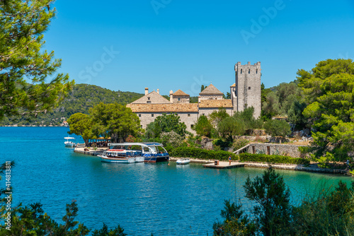 Small island with benedictine monastery of Saint Mary at Mljet national park in Croatia photo