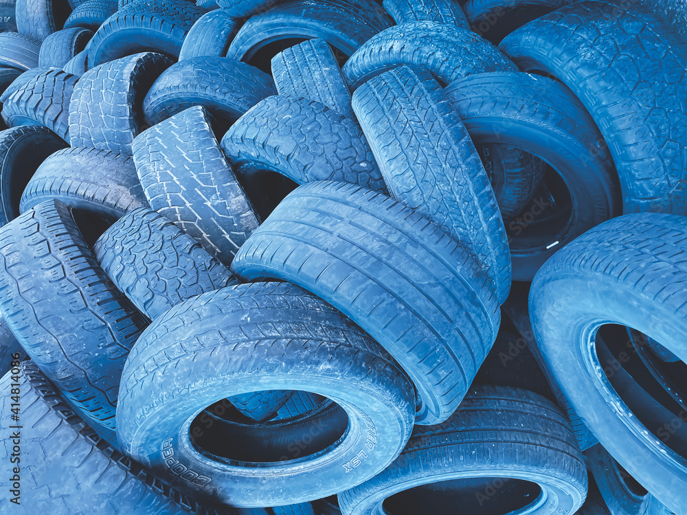 Obraz premium stack of tires in blue