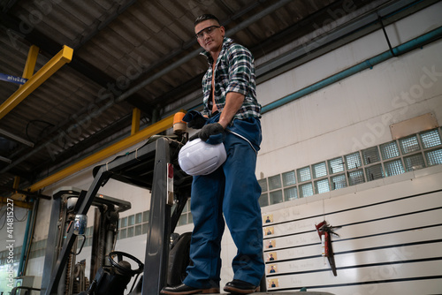 Wallpaper Mural Worker factory man concept. Inspection technician, factory engineer, inspection of the machine condition in the factory. Inspection by technicians, industrial business, production machinery Torontodigital.ca