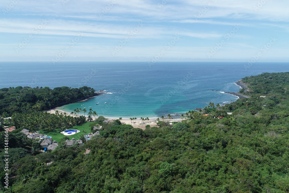 Aerial view of the jungle and Pacific Ocean in Mexico