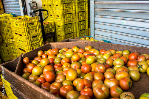 Sao Paulo, Brazil, September 02, 2014. Tomatoes in boxes for fruit trade at CEAGESP (General Warehouse Company of Sao Paulo), in Vila Leopoldina neighborhood, west side of Sao Paulo photo