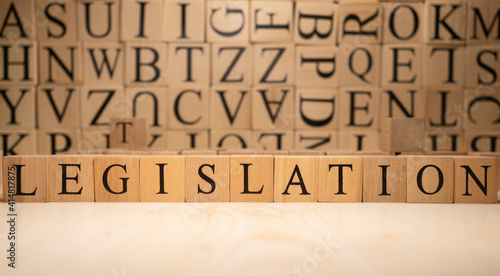 The word legislation from wooden cubes. Economy state government terms.