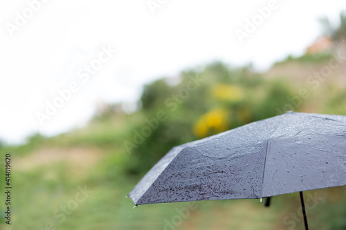 Umbrella under the rain.
