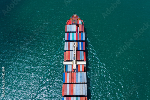 Industry business logistics cargo containers ship by the sea camera from drone aerial view.