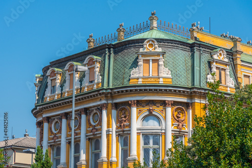 Yellow facade of Modello palace at Rijeka, Croatia photo