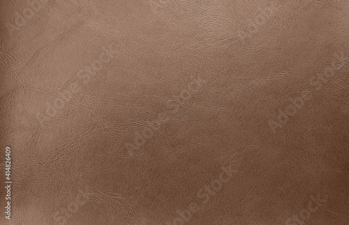 close up brown leather texture background. abstract vintage concept background. top view of genuine leather. photo