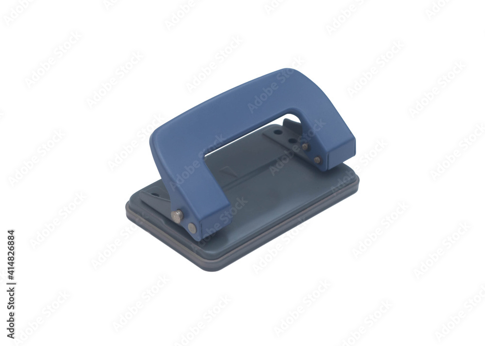 Close up paper puncher isolated over white background. Close up paper puncher isolated over white background.