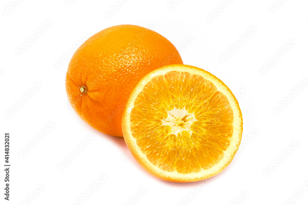 Slieced and whole fresh tropical oranges on white background Slieced and whole fresh tropical oranges on white background