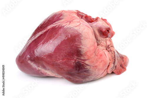 Фотография raw pig heart close-up isolated on white background