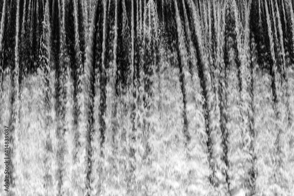 Beautiful texture of white bubbling water. Waterfall
