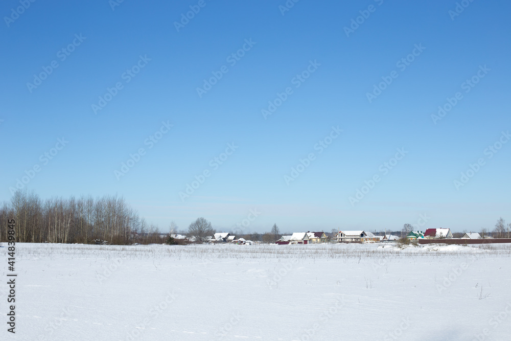 Winter landscape, blue skies and sparkling snow
