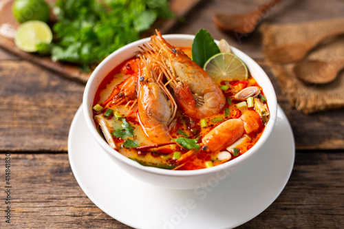 Tom Yam Kung ,Prawn and lemon soup with mushrooms, thai food in white bowl top view