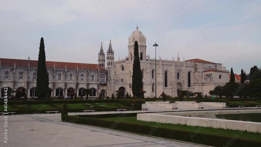SLOW MOTION: Portuguese monument (Mosteiro dos Jerónimos) with park in foreground SLOW MOTION: Portuguese monument (Mosteiro dos Jerónimos) with park in foreground