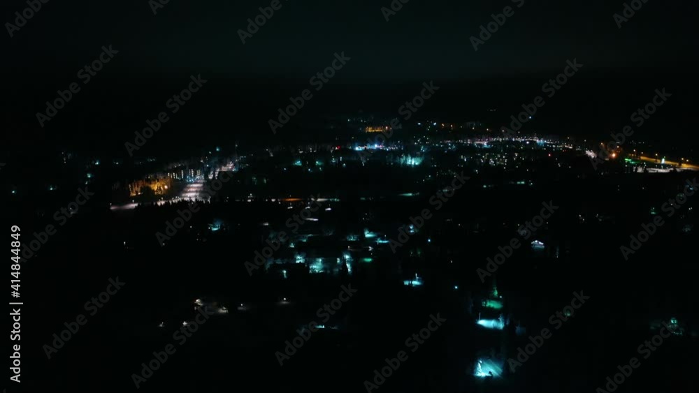 Aerial view of the Saariselka town, winter night, in Lapland - drone approach Aerial view of the Saariselka town, winter night, in Lapland - drone approach
