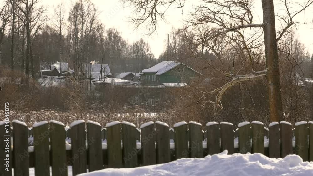 a village in Russia in winter in the snow a village in Russia in winter in the snow