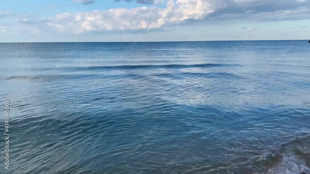 Horizon where sea and sky meet. Sunny summer day on the sea shore. Horizon where sea and sky meet. Sunny summer day on the sea shore.