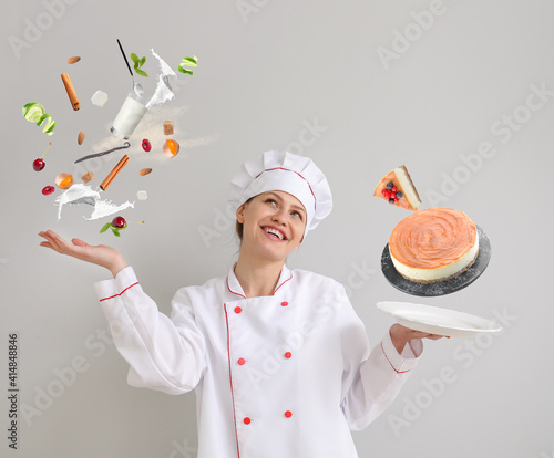 Female confectioner with fl...