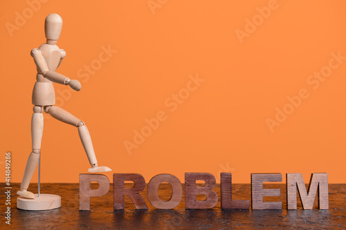 Wooden mannequin with word ...
