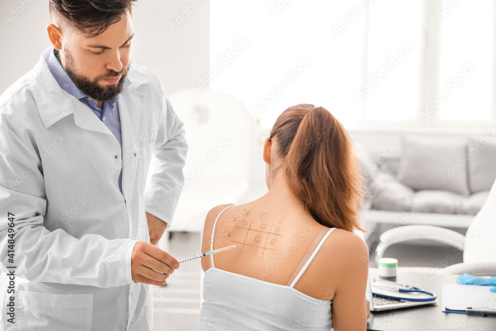 Fototapeta premium Young woman undergoing allergen skin test in clinic