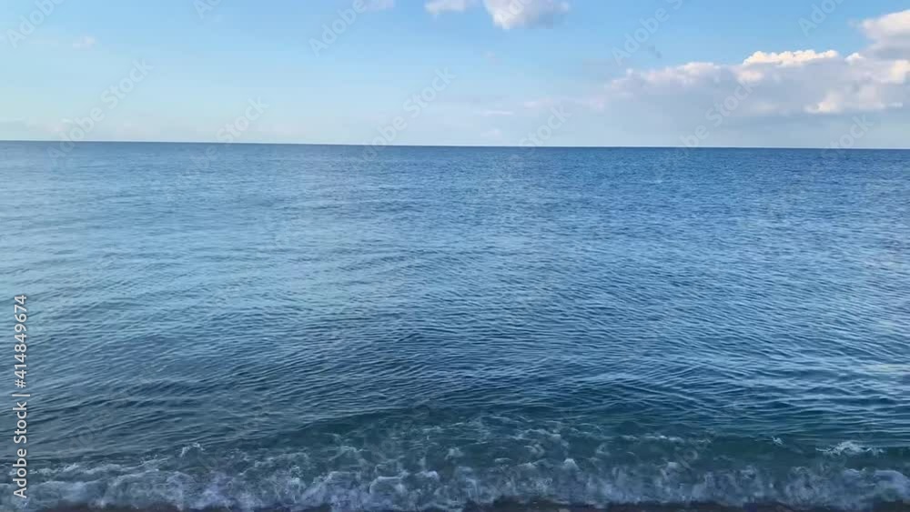 Horizon where sea and sky meet. Sunny summer day on the sea shore. Horizon where sea and sky meet. Sunny summer day on the sea shore.