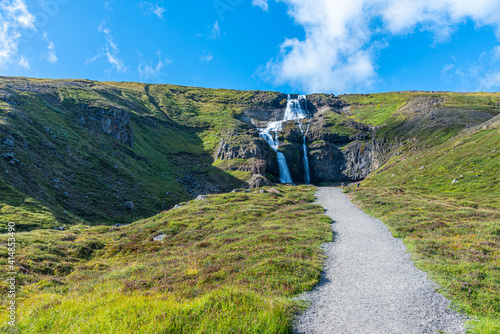 Rjukandi waterfall viewed during sunny day on Iceland photo