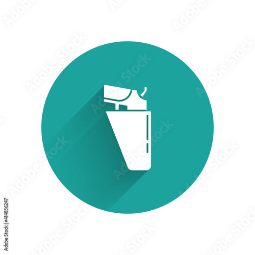 White Revolver gun in holster icon isolated with long shadow. Green circle button. Vector.