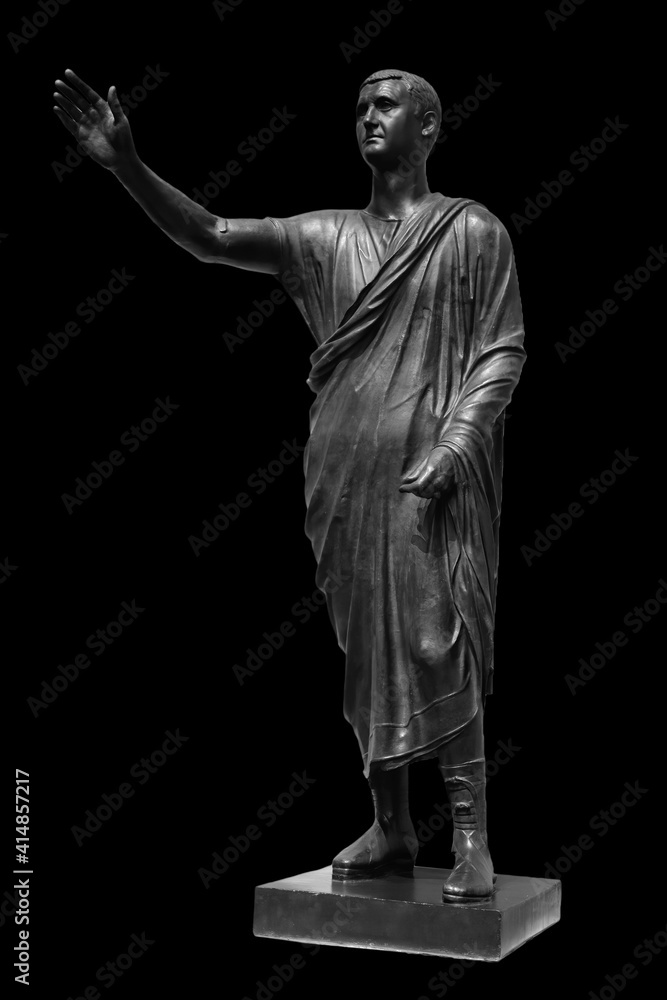 Obraz premium Statue of Roman statesman, lawyer, orator and philosopher. Isolated on black. Ancient antique roman sculpture
