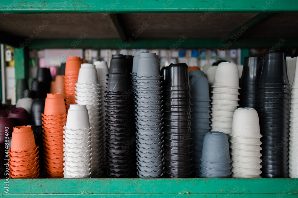Small plant pots of various shapes and colors Small plant pots of various shapes and colors