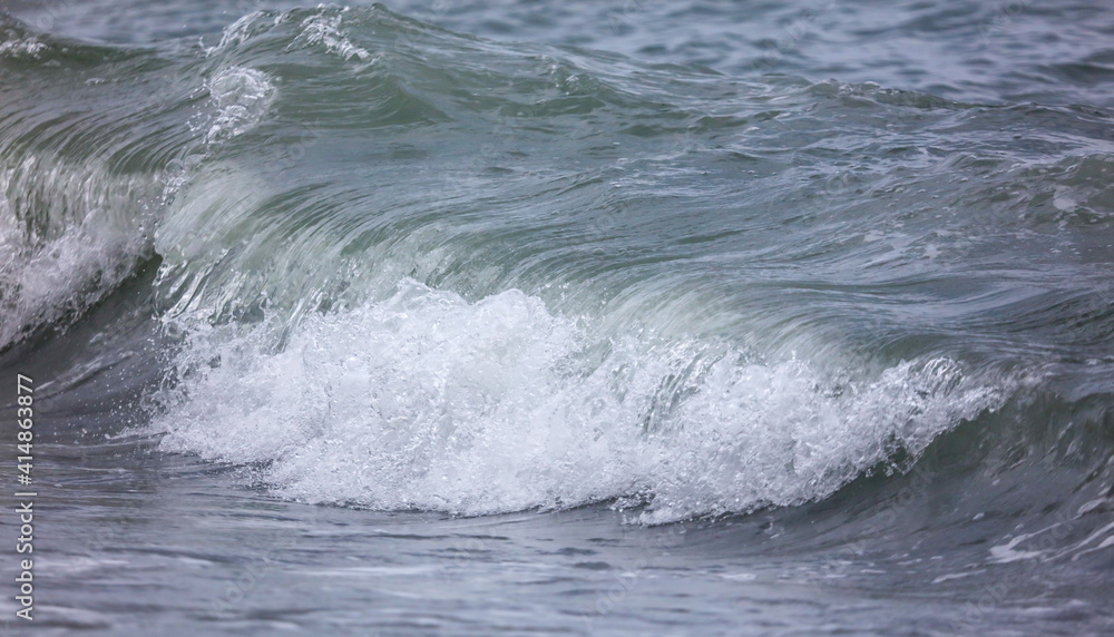 Fototapeta premium Wave in the sea with splashing water.