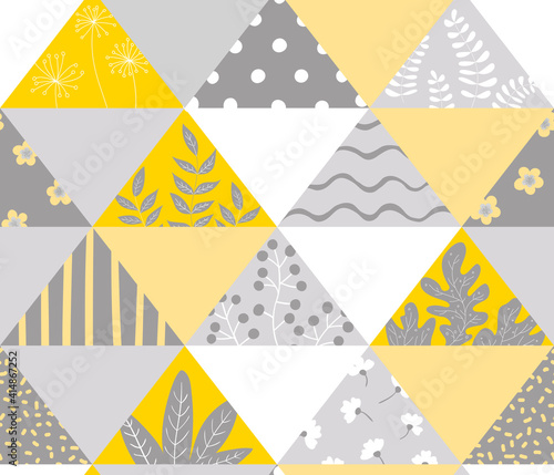 Triangular patchwork with abstract branches, leaves and flowers yollow and gray panteon 2021. Seamless pattern. Vector illustration for textiles, wrapping paper photo