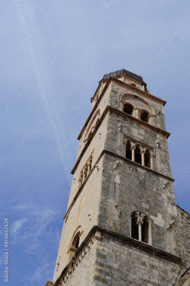 Old bell tower in Dubrovnik, high big bell tower