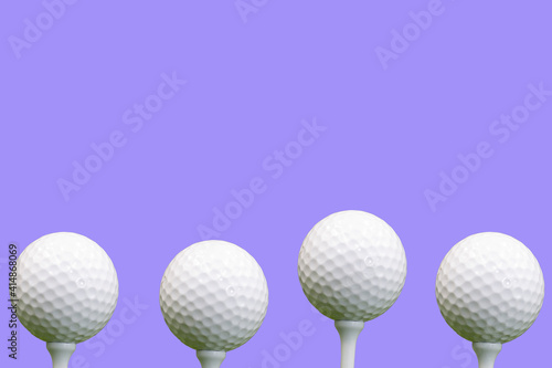 Golf ball is on purple background