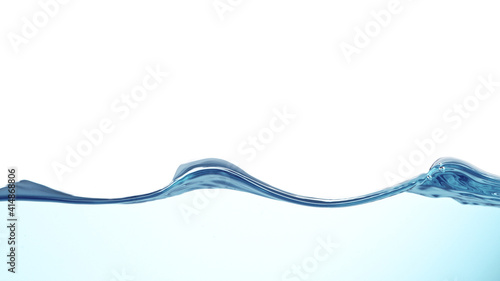 Waves of blue water on whit...