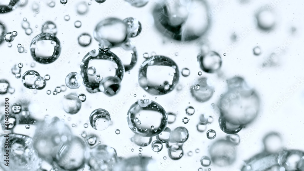 Light bubbles of water isolated over white, macro shot. Light bubbles of water isolated over white, macro shot.