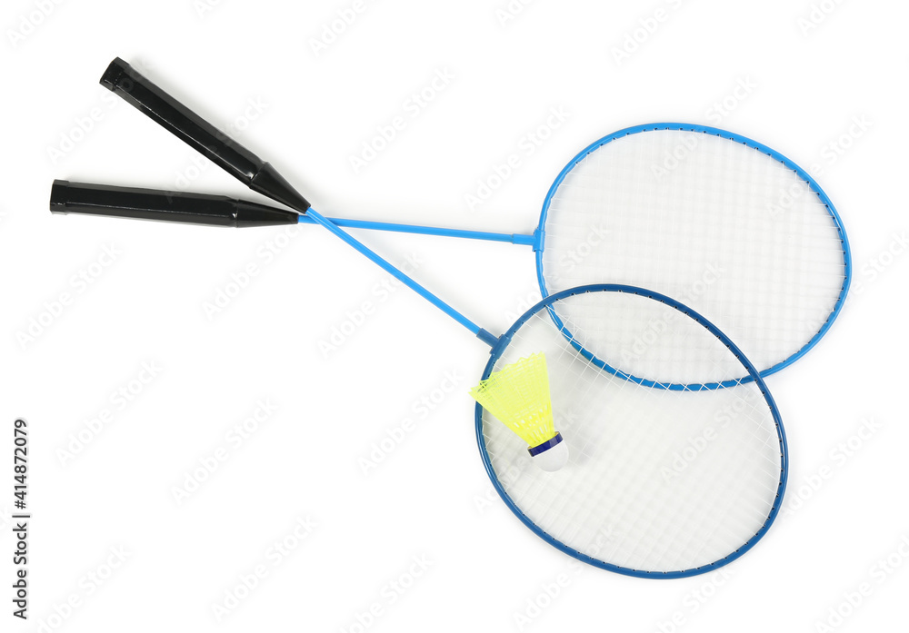 Rackets and shuttlecock on white background, top view. Badminton equipment Rackets and shuttlecock on white background, top view. Badminton equipment