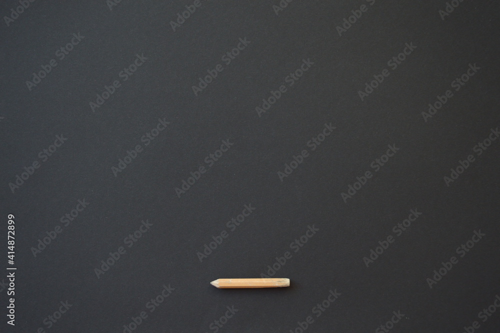 simple pencil on black background simple pencil on black background