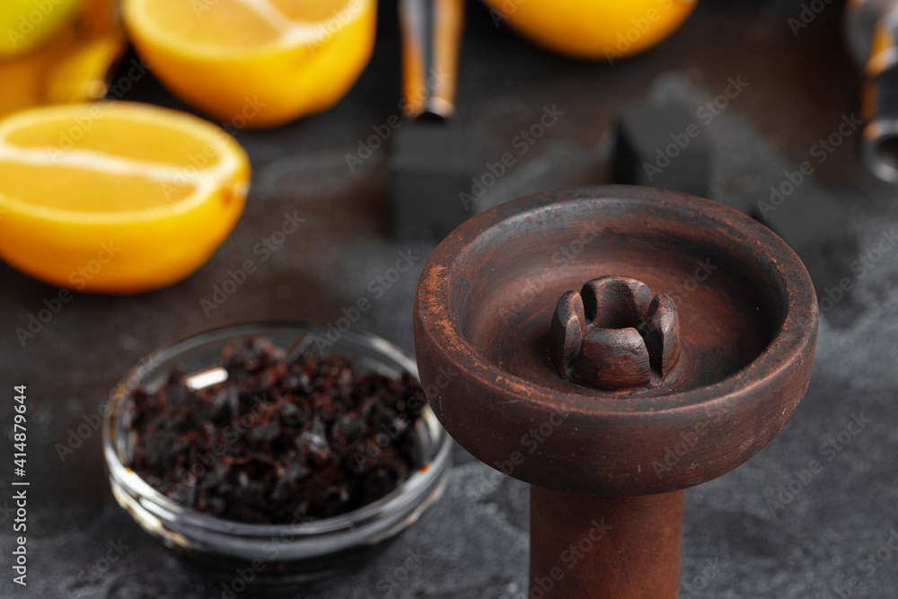 Hookah pipe and shaft with fruits on gray background Hookah pipe and shaft with fruits on gray background