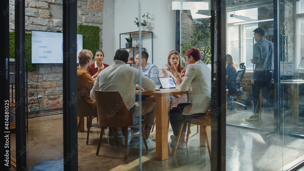 Diverse Group of Professional Businesspeople Meeting in the Modern Office Conference Room. Creative Team Discuss App Design, Analyze Data, Plan Marketing Strategy, Disrupt Social Media, Growth Hack