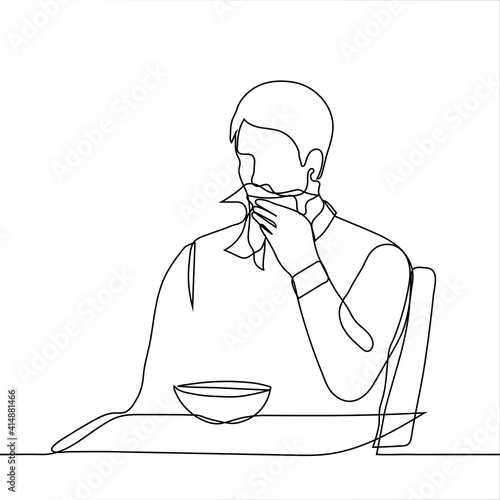 man wipes his mouth with a tissue after eating - one line drawing. a man sits at a table over a round deep plate and wipes his face with a kitchen napkin