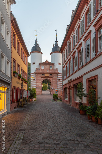 Sunrise view of the old bridge gate in Heidelberg, Germany photo