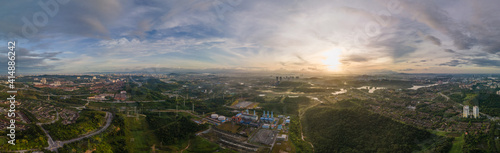 Aerial Panorama view of a Gas Turbine Power Plant Station during sunrise. Gas Turbine converts Natural Gas or other liquid fueils to Mechanical Energy