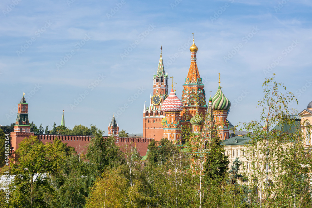 View to Cathedral of Vasily the Blessed and Spasskaya Tower on the background, Moscow Kremlin, Russia View to Cathedral of Vasily the Blessed and Spasskaya Tower on the background, Moscow Kremlin, Russia
