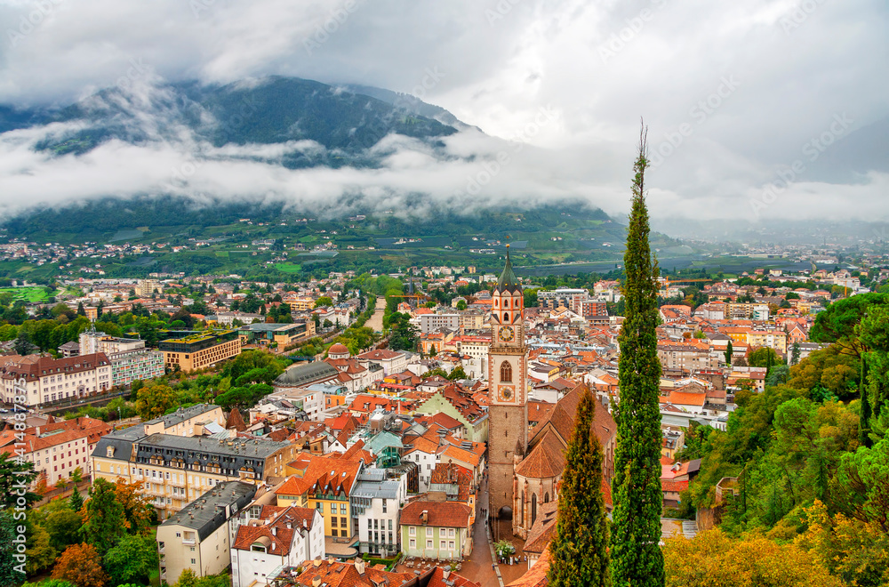 The church of St Nicholas in the old town of Merano, South Tyrol, Italy. Top view of the historic center of the old city.