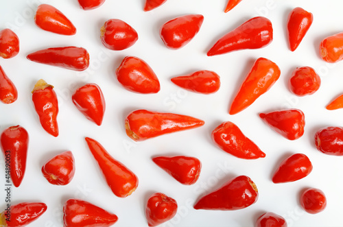 Small hot red chili pickled isolated on white background