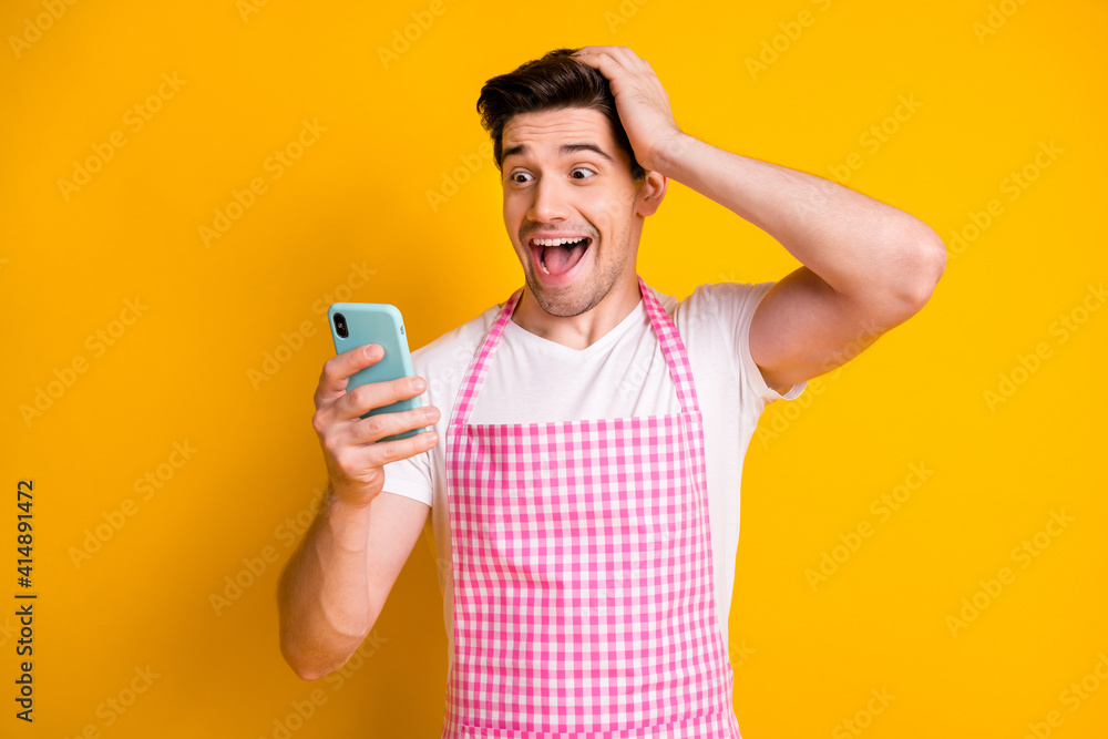 Photo of astonished man hand on head open mouth unexpected blog post comment isolated on yellow color background Photo of astonished man hand on head open mouth unexpected blog post comment isolated on yellow color background