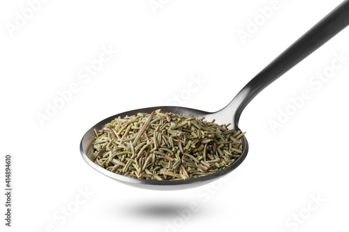 dried rosemary in steel spoon isolated on white background