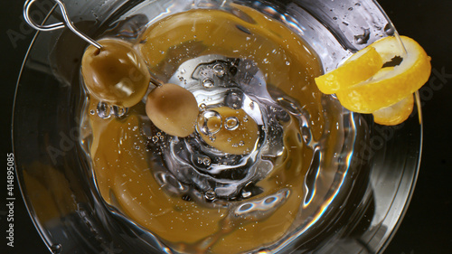 Splashing olives into a mar...