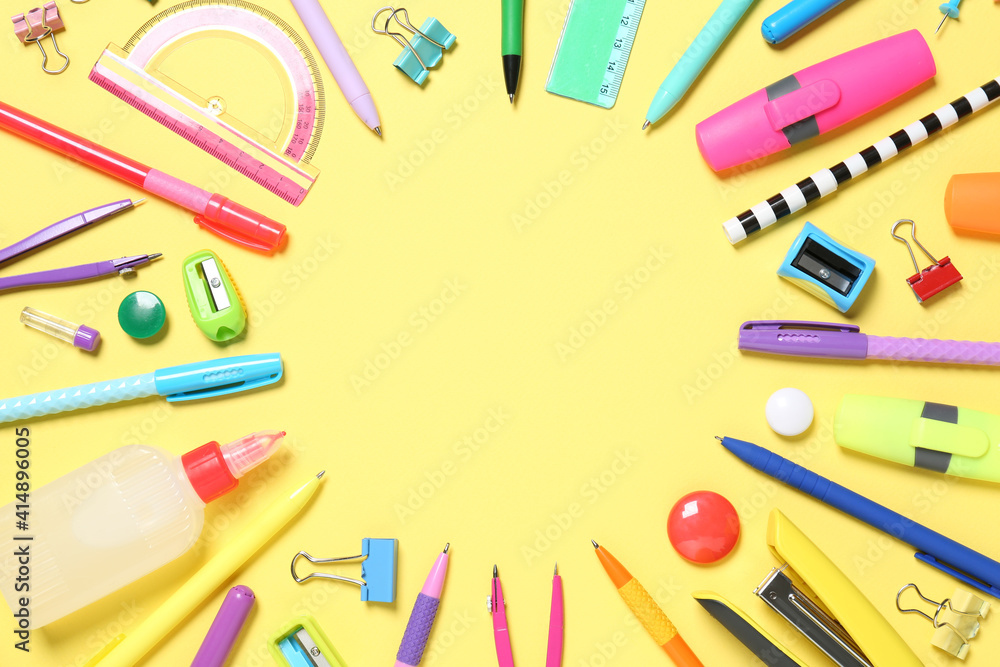Frame of different school stationery on yellow background, flat lay. Space for text Frame of different school stationery on yellow background, flat lay. Space for text