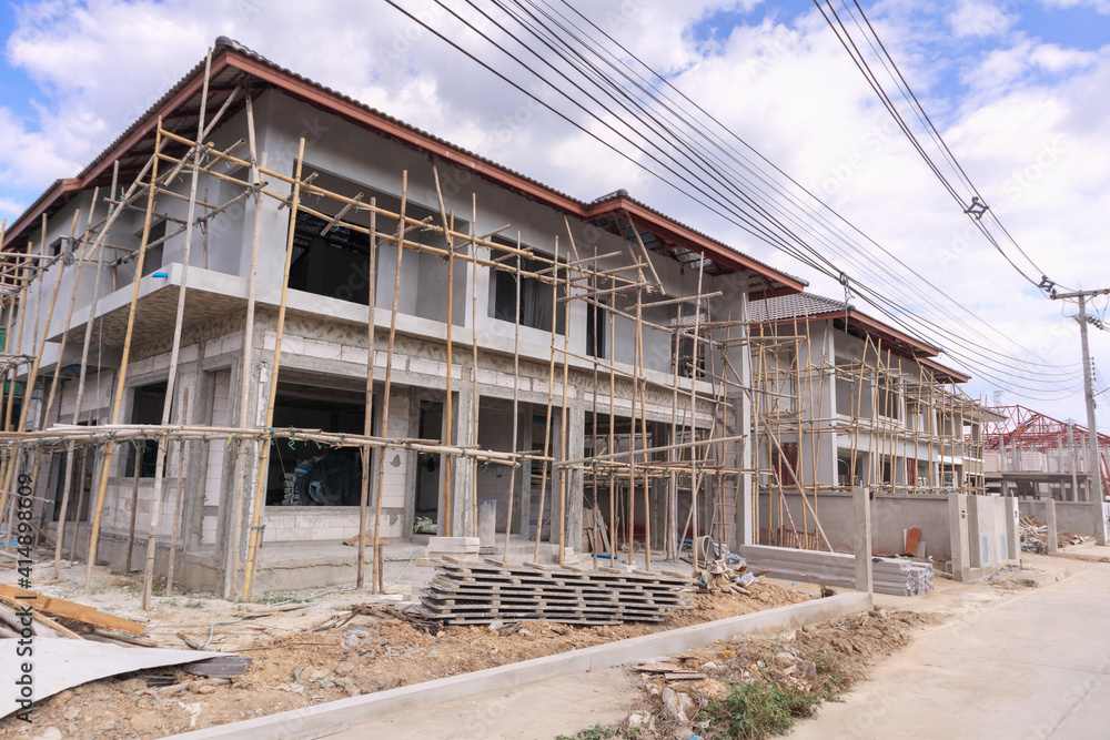 construction residential new house in progress at building site construction residential new house in progress at building site